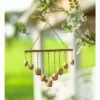 Wind & Weather Handcrafted Nine Metal Bells Wind Chime With Antiqued Golden Finish 2 Wind & Weather Handcrafted Nine Metal Bells Wind Chime With Antiqued Golden Finish -Sunnydaze Decor Store GUEST 40cc3a8f 7378 4c79 a2f6 8e44e4d4ed75