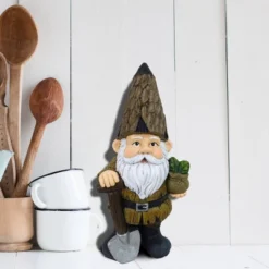 16" Magnesium Oxide Indoor/Outdoor Garden Gnome With Shovel And Plant Statue Brown - Alpine Corporation